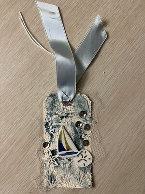 Sailboat tag
Texture Tag
Keywords: gesso;onion bag;ink;sequins;ribbon;sailboat;arrow